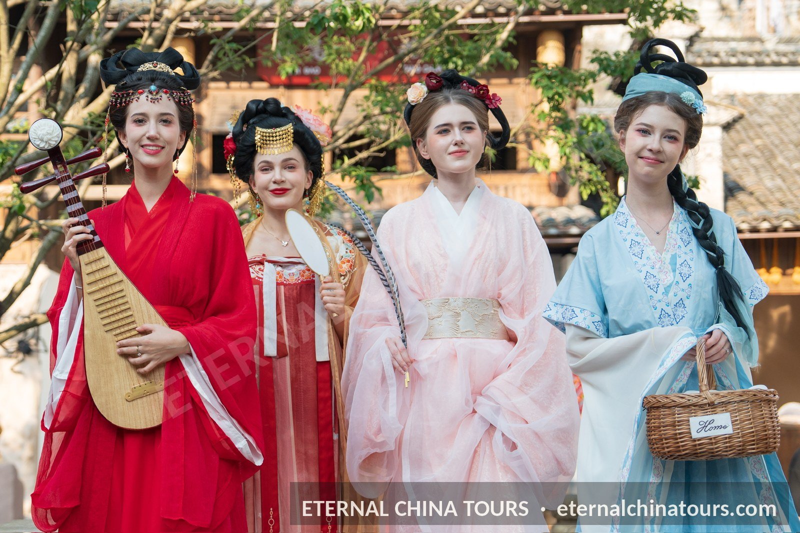 Four travelers in Hanfu costumes posing together