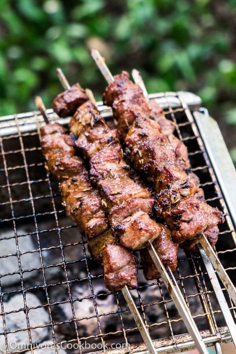 Xinjiang lamb skewers on charcoal