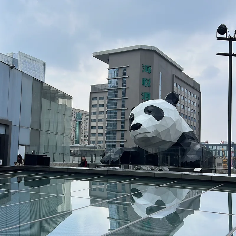 The famous climbing panda sculpture at IFS, the meeting point